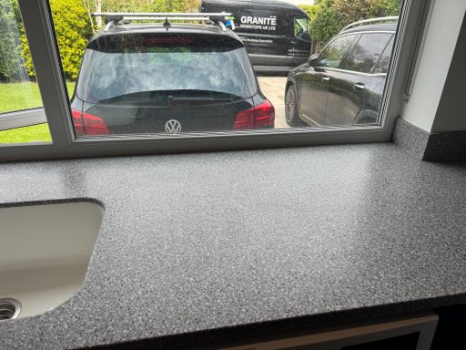 After repair: refinished Corian in Leeds Grey Corian worktop in Leeds after crack filling, sanding flat and refinishing