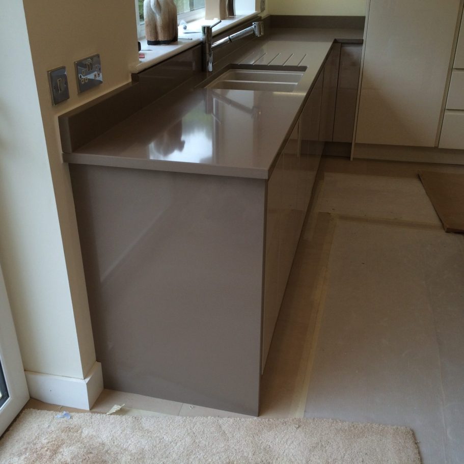 Granite surface worktop repair. Scuffed Brown granite, chipped edges, dull surface area , we repolished all the surface and filled all the chipped granite at the edges.