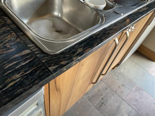 After repair: restored granite sink run Huddersfield granite sink worktop after the broken front section was refitted